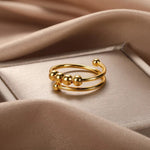 Anel anti-stress dourado título por defeito