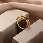 Anel anti-stress dourado título por defeito