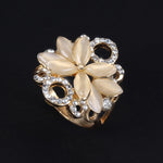 Anel de flor com diamante dourado