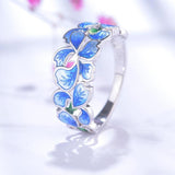 Anel flor azul prata