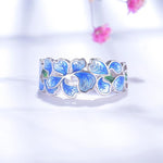Anel flor azul prata
