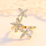 Anel flor de diamante dourado