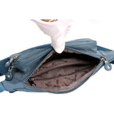 Bolsa de cintura com vários bolsos