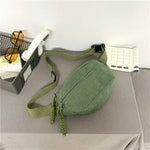 Bolsa de cintura em veludo verde