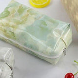 Bolsa de maquilhagem padrão marmoreado verde