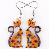 Brincos artísticos gato laranja valor por defeito título