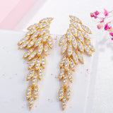 Brincos asa de anjo com strass amarelo dourado