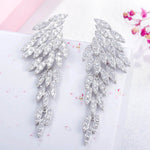 Brincos asa de anjo com strass