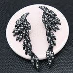 Brincos asa de anjo com strass preto