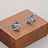 Brincos cabeça de lobo