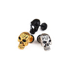 Brincos caveira metal