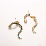 Brincos coloridos cobra valor por defeito título