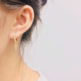 Brincos femininos cruz em metal dourado