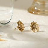 Brincos flor metal dourado valor por defeito título