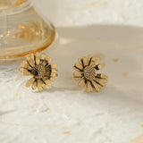 Brincos flor metal dourado valor por defeito título