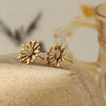 Brincos flor metal dourado valor por defeito título