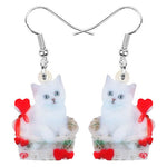 Brincos forma de gatinho no cesto valor por defeito título