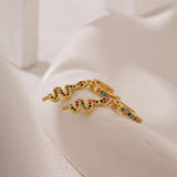Brincos serpente dourada com diamantes multicolores valor por defeito título