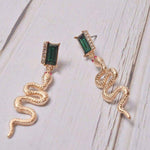 Brincos serpente strass valor por defeito título