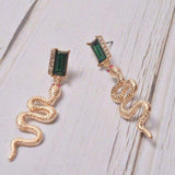 Brincos serpente strass valor por defeito título