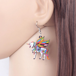 Brincos unicórnio pegasus multicolores valor por defeito título