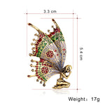 Broche anjo borboleta ouro