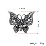 Broche borboleta com diamantes