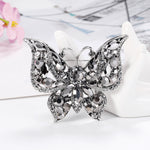 Broche borboleta com diamantes