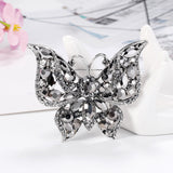 Broche borboleta com diamantes