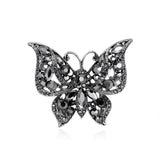 Broche borboleta com diamantes preto