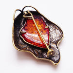 Broche de âmbar valor por defeito título