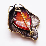 Broche de âmbar valor por defeito título