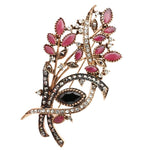 Broche de pedra vermelho
