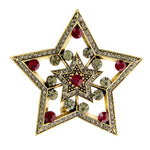 Broche estrela vermelho