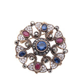 Broche floral azul