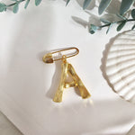 Broche inicial