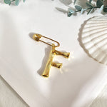 Broche inicial f