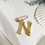 Broche inicial n