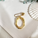 Broche inicial