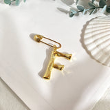 Broche inicial