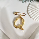 Broche inicial