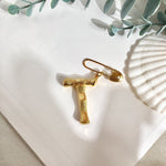 Broche inicial t