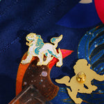 Broche leão branco