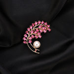 Broche metal e zircônia como mostra