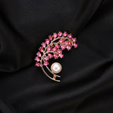 Broche metal e zircônia como mostra