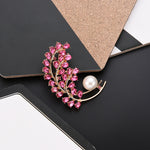 Broche metal e zircônia como mostra