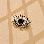 Broche olho