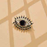 Broche olho