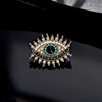 Broche olho