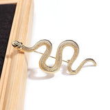 Broche serpente ouro